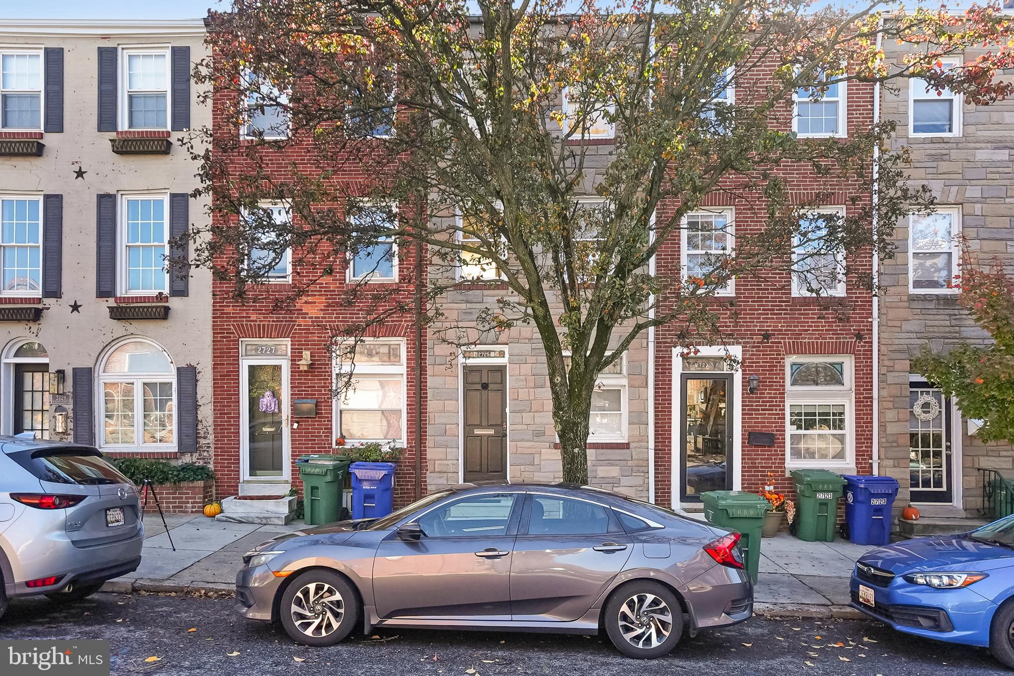 2725 Hudson Street Baltimore, MD 21224 - Photo 6 of 66 a front view of a house with parking space
