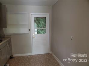3838 Tuckaseegee Road Charlotte, NC 28208 - Photo 5 of 9 an empty room with window