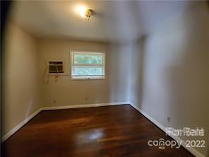 3838 Tuckaseegee Road Charlotte, NC 28208 - Photo 6 of 9 an empty room with a window