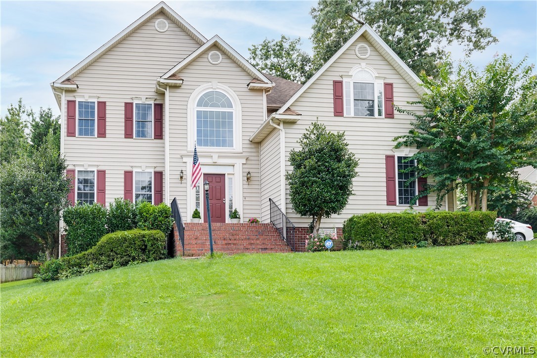 1101 Goswick Ridge Road Midlothian, VA 23114 - Photo 1 of 34 a front view of a house with a yard