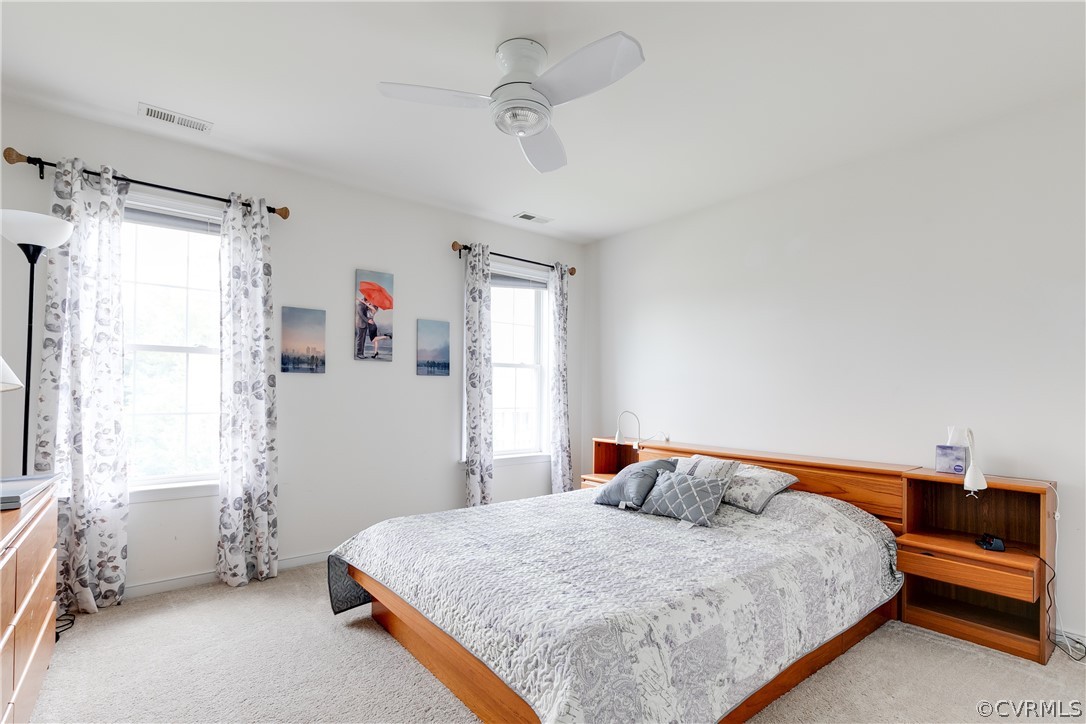 1101 Goswick Ridge Road Midlothian, VA 23114 - Photo 21 of 34 a bedroom with a bed and a window
