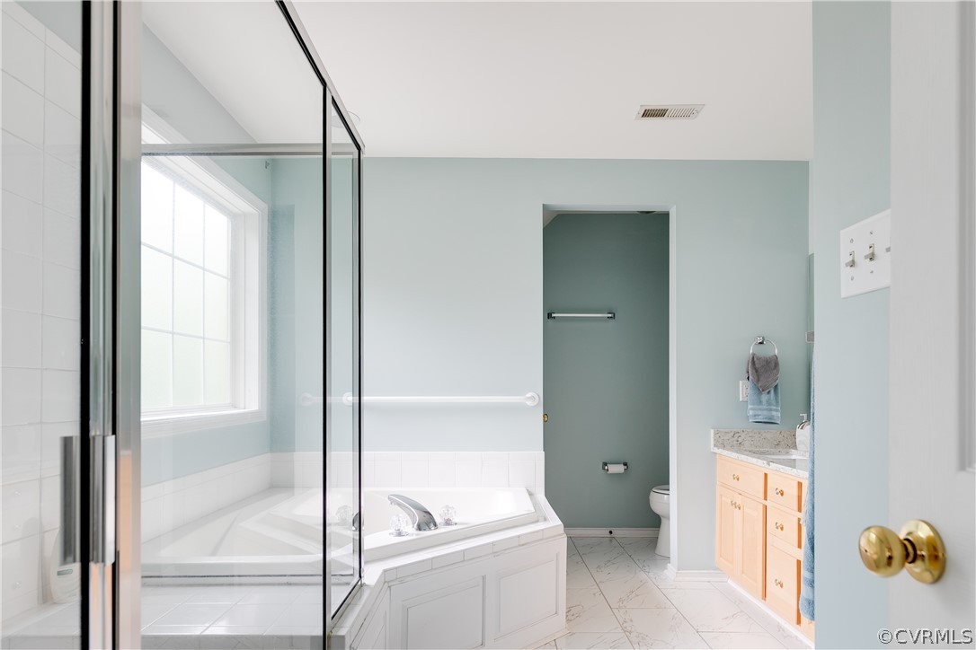 1101 Goswick Ridge Road Midlothian, VA 23114 - Photo 27 of 34 a bathroom with a tub and shower
