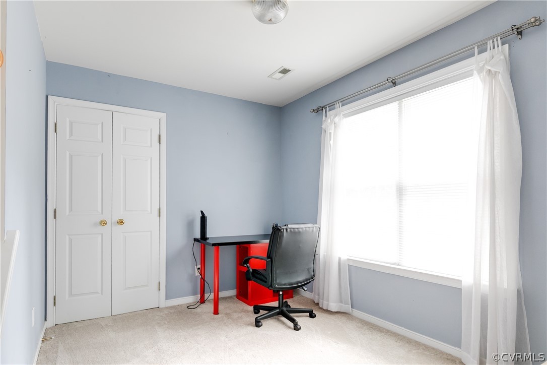1101 Goswick Ridge Road Midlothian, VA 23114 - Photo 30 of 34 a view of a room with gym equipment and a window