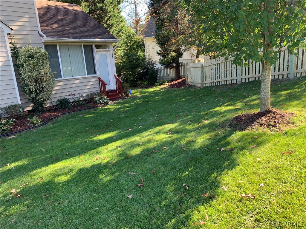 1101 Goswick Ridge Road Midlothian, VA 23114 - Photo 34 of 34 a view of a house with a yard and a garden