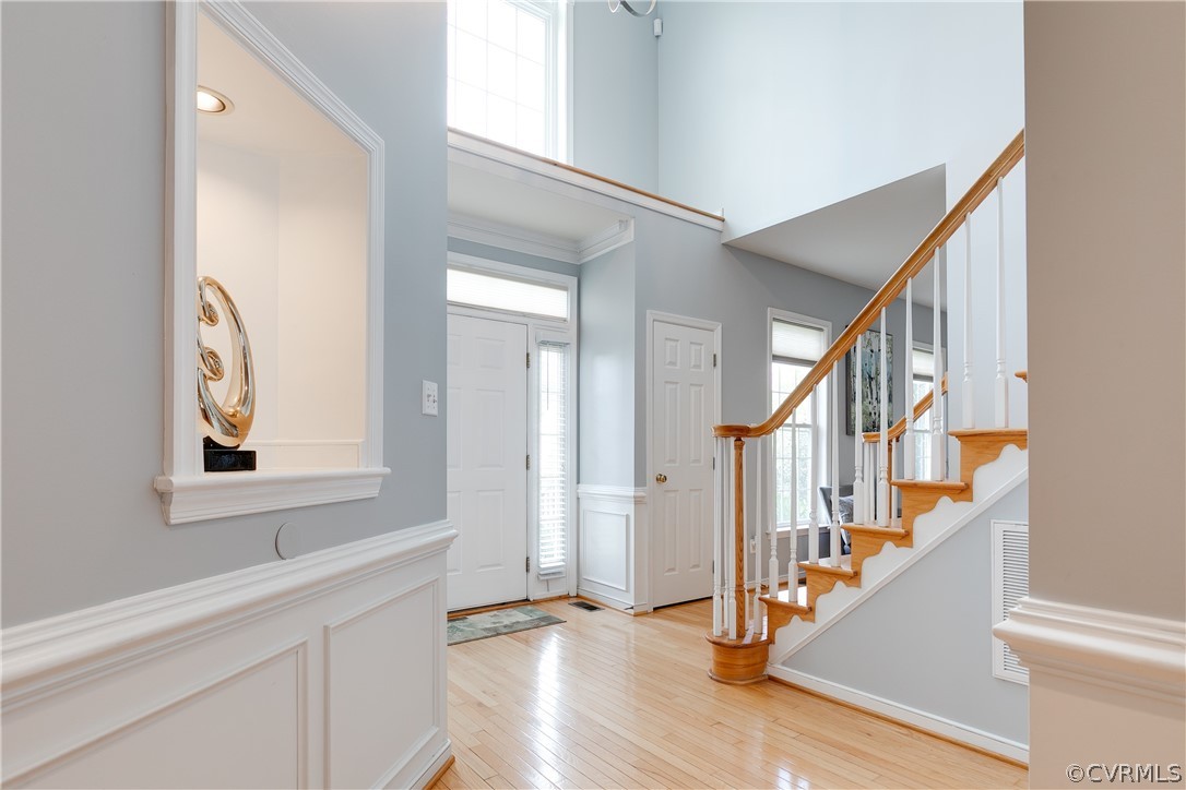 1101 Goswick Ridge Road Midlothian, VA 23114 - Photo 6 of 34 a view of an entryway with wooden floor and stairs