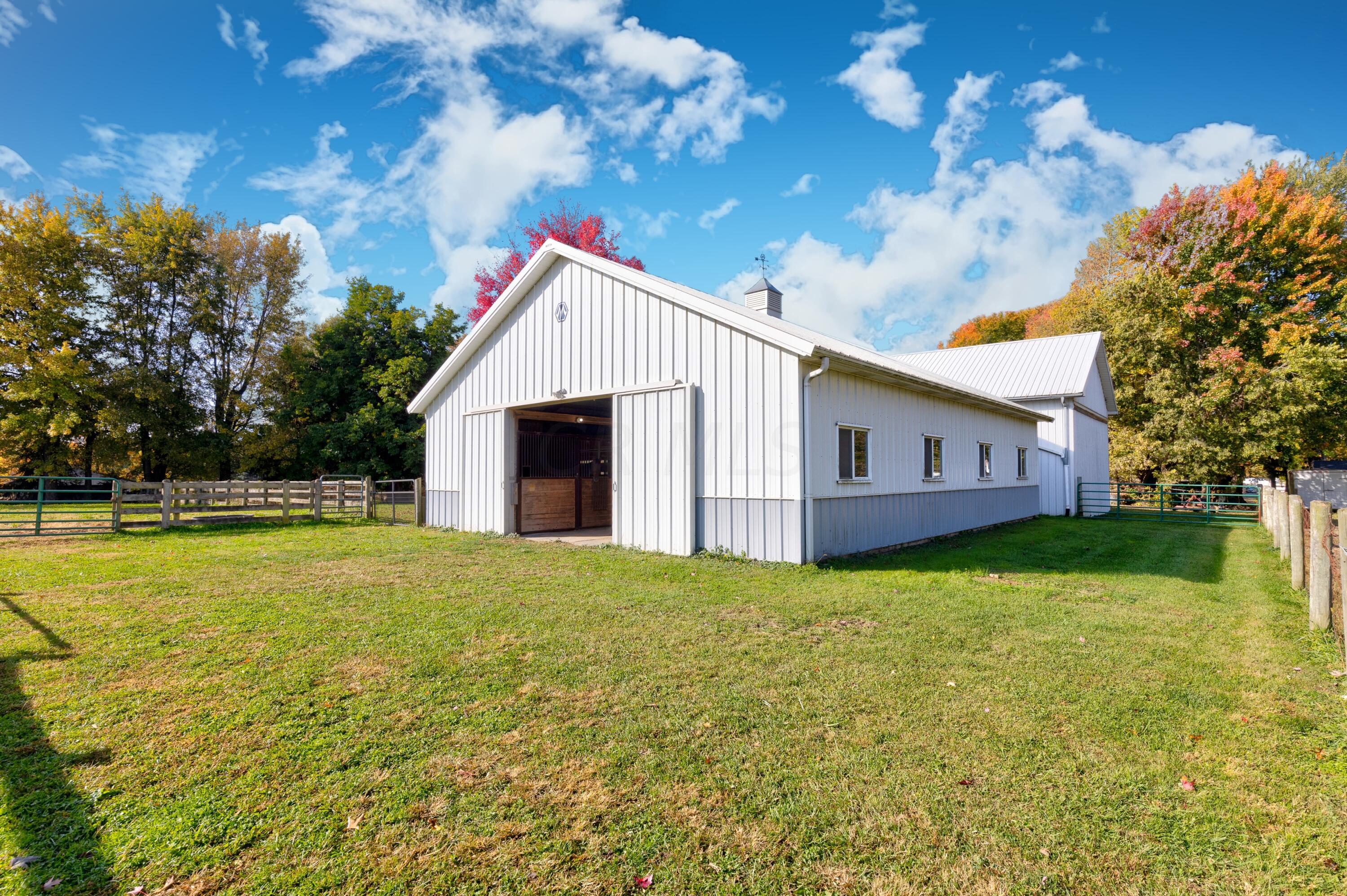 6681 Harlem Road Westerville, OH 43082 - Photo 52 of 78 • New Morton Barn ~ 1997 • Steel/aluminum siding • Flood lights • Service door • Farm equiptment can be purchased separate as chattel