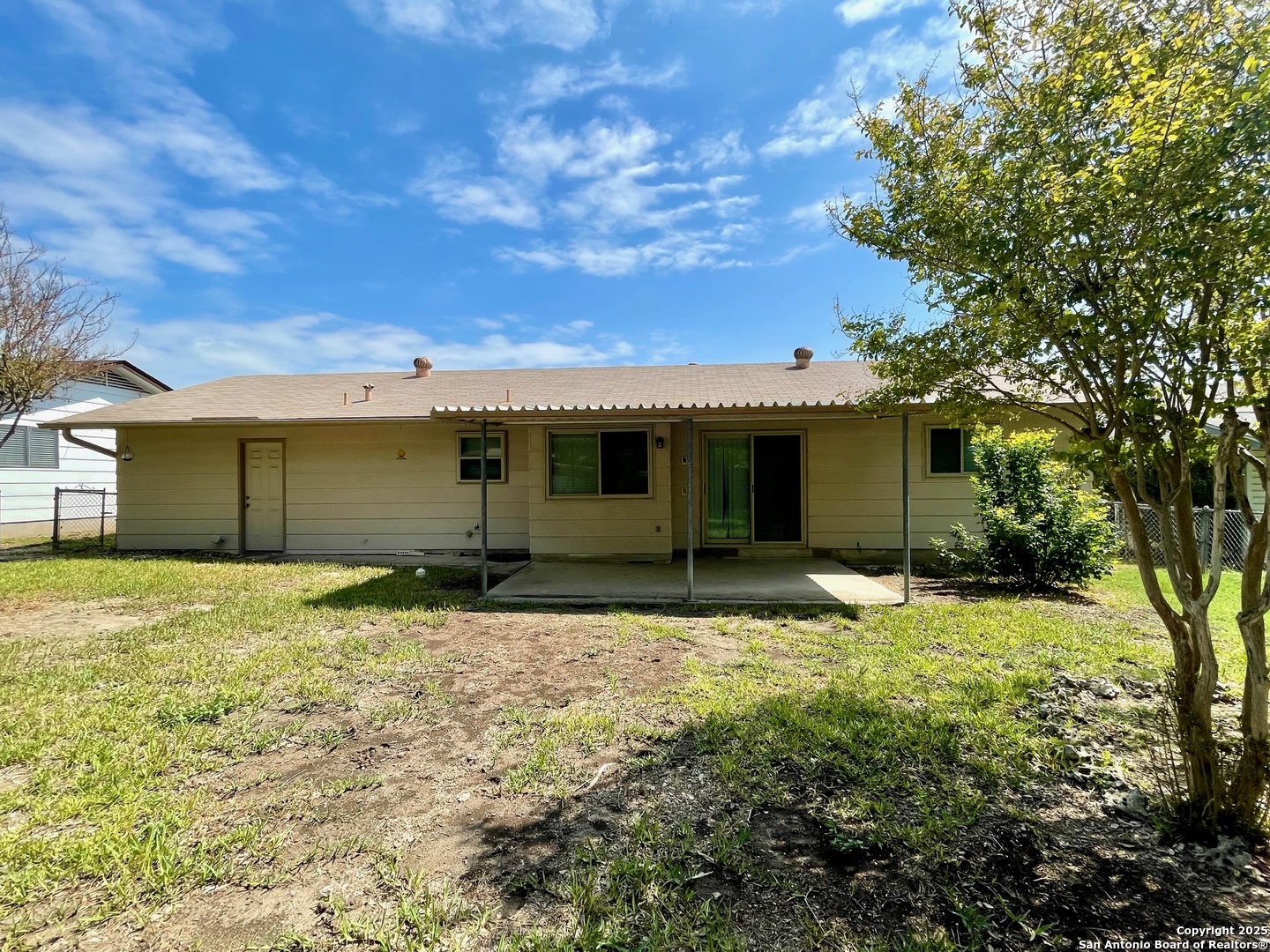 6714 Straw Flower Street Leon Valley, TX 78238 - Photo 21 of 23 a front view of a house with a yard
