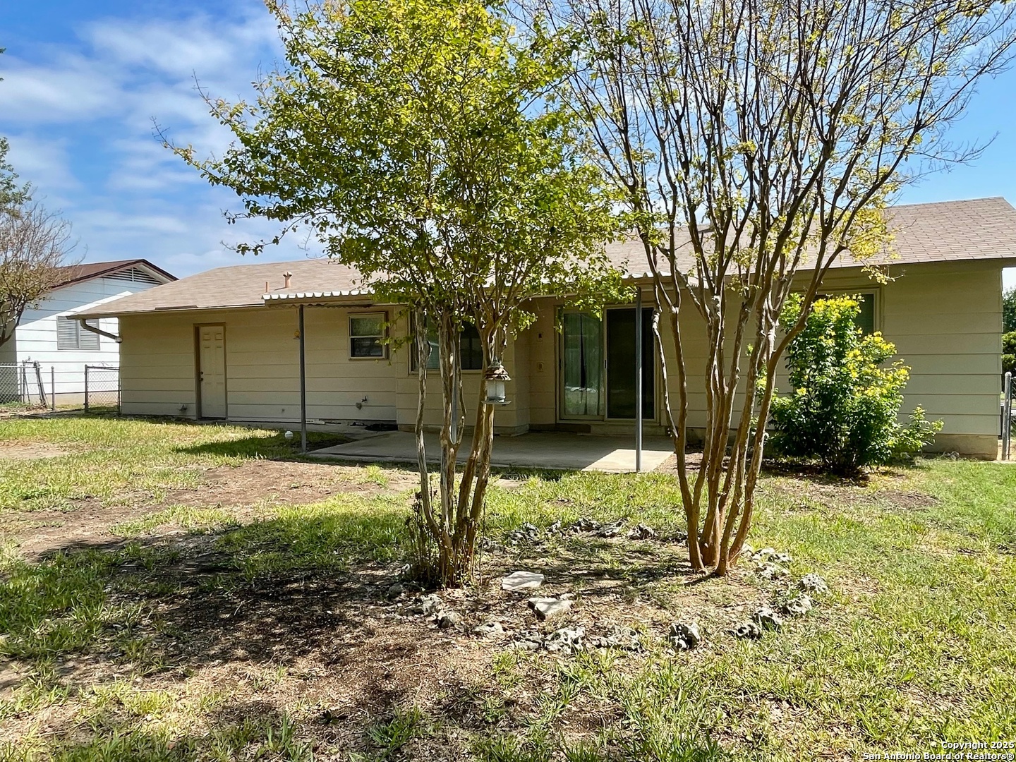 6714 Straw Flower Street Leon Valley, TX 78238 - Photo 22 of 23 a house that has a tree in front of it