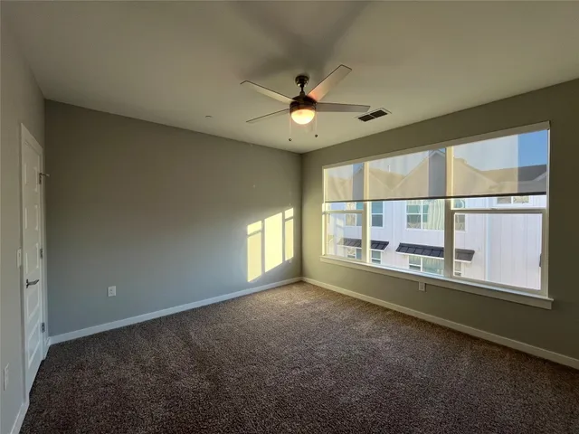 a view of empty room with a window