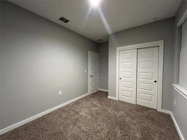 an empty room with closet