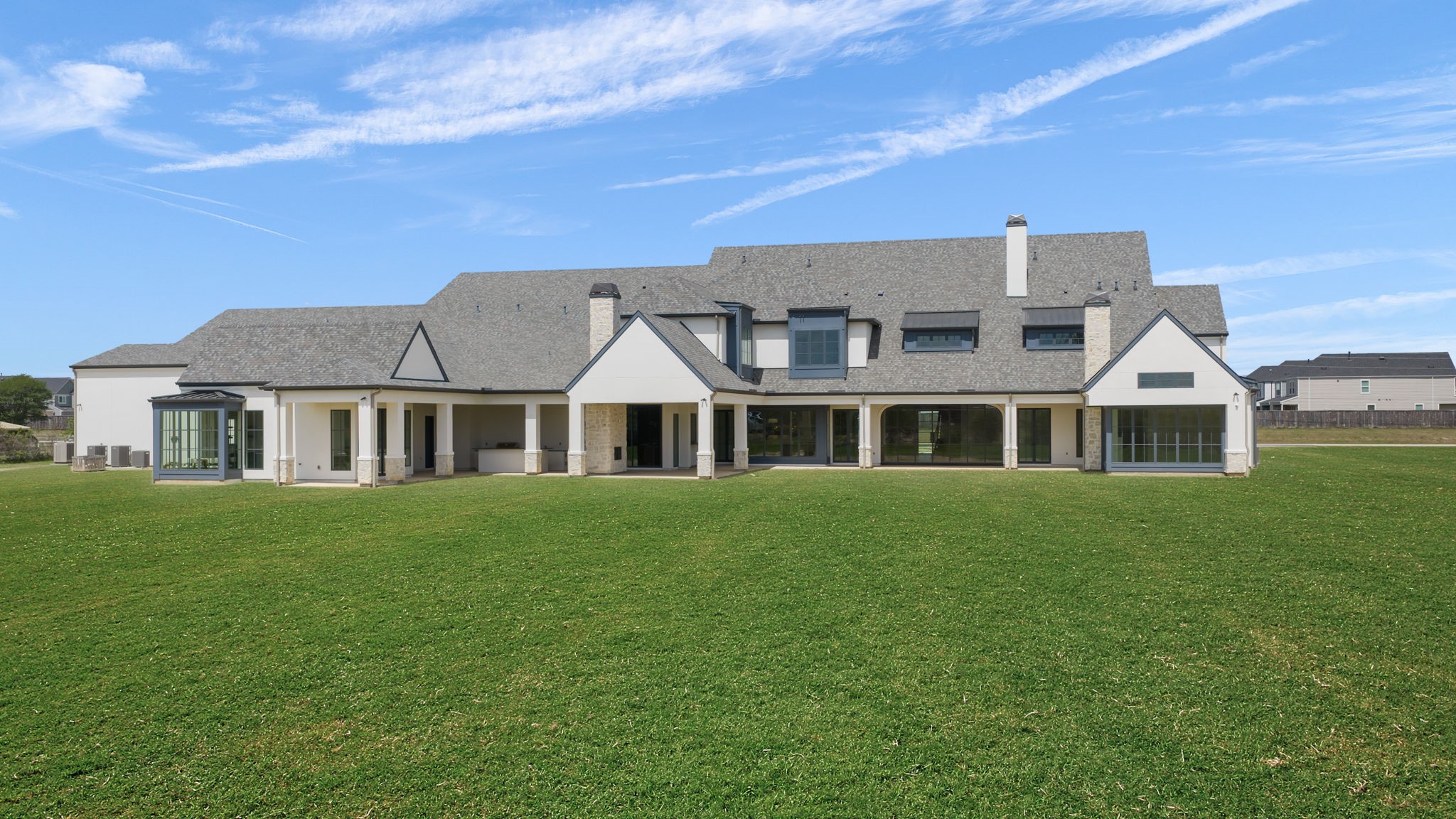 4233 Two Gun Way Katy, TX 77494 - Photo 28 of 47 Rear elevation digitally enhanced grass.