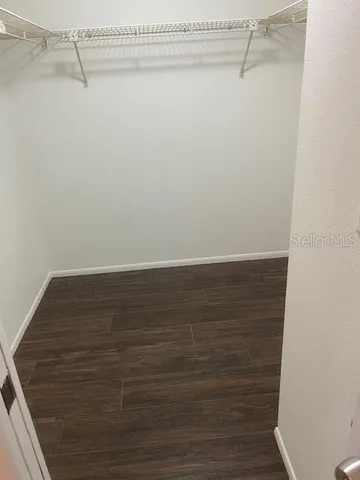 a view of small space with racks on the wall