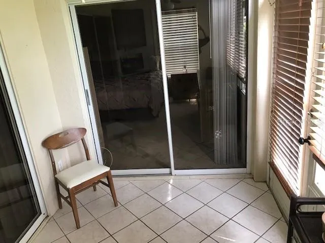 a bathroom with a window and a shower