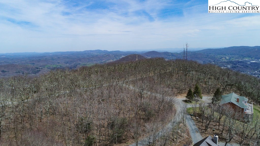 E-8 Fire Tower Road Boone, NC 28607 - Photo 6 of 25 a view of a dry yard with mountains in the background