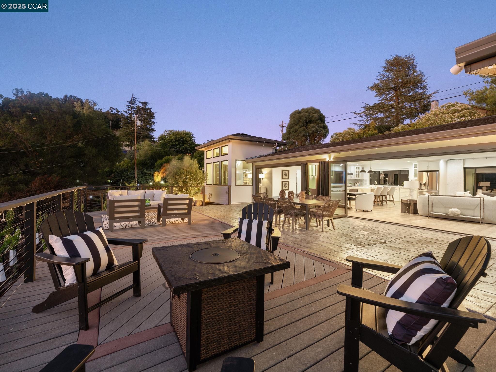 a view of a chairs and table on the deck