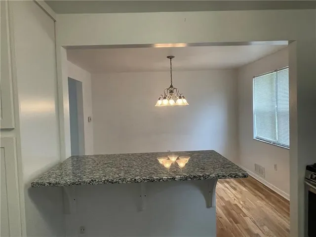 a view of a chandelier fan