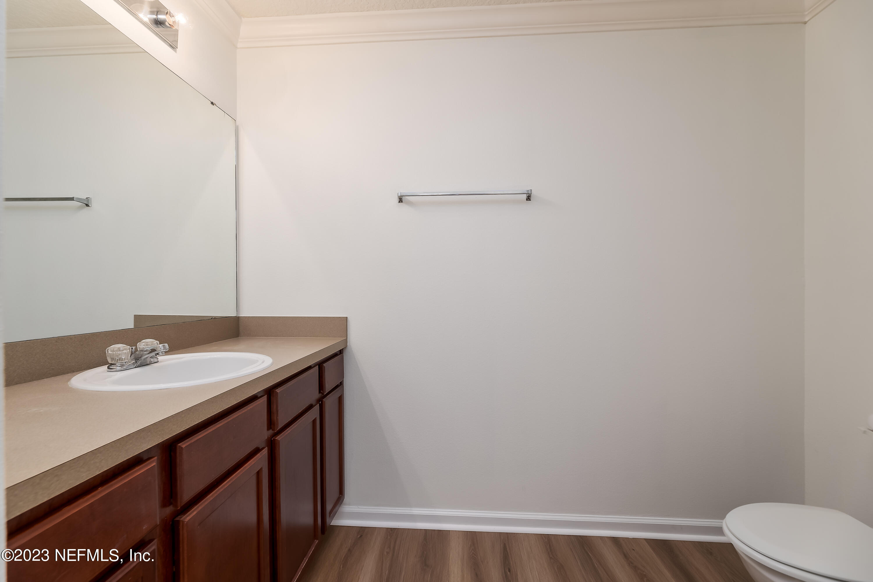 5260 Collins Road, Unit 1102 Jacksonville, FL 32244 - Photo 10 of 23 a bathroom with a sink and a toilet