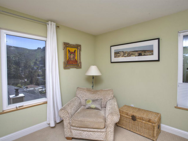 104 Nataqua Avenue Pacifica, CA 94044 - Photo 14 of 17 a living room with furniture and a window