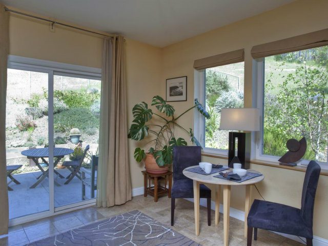 104 Nataqua Avenue Pacifica, CA 94044 - Photo 9 of 17 a view of a dining room with furniture window and outside view