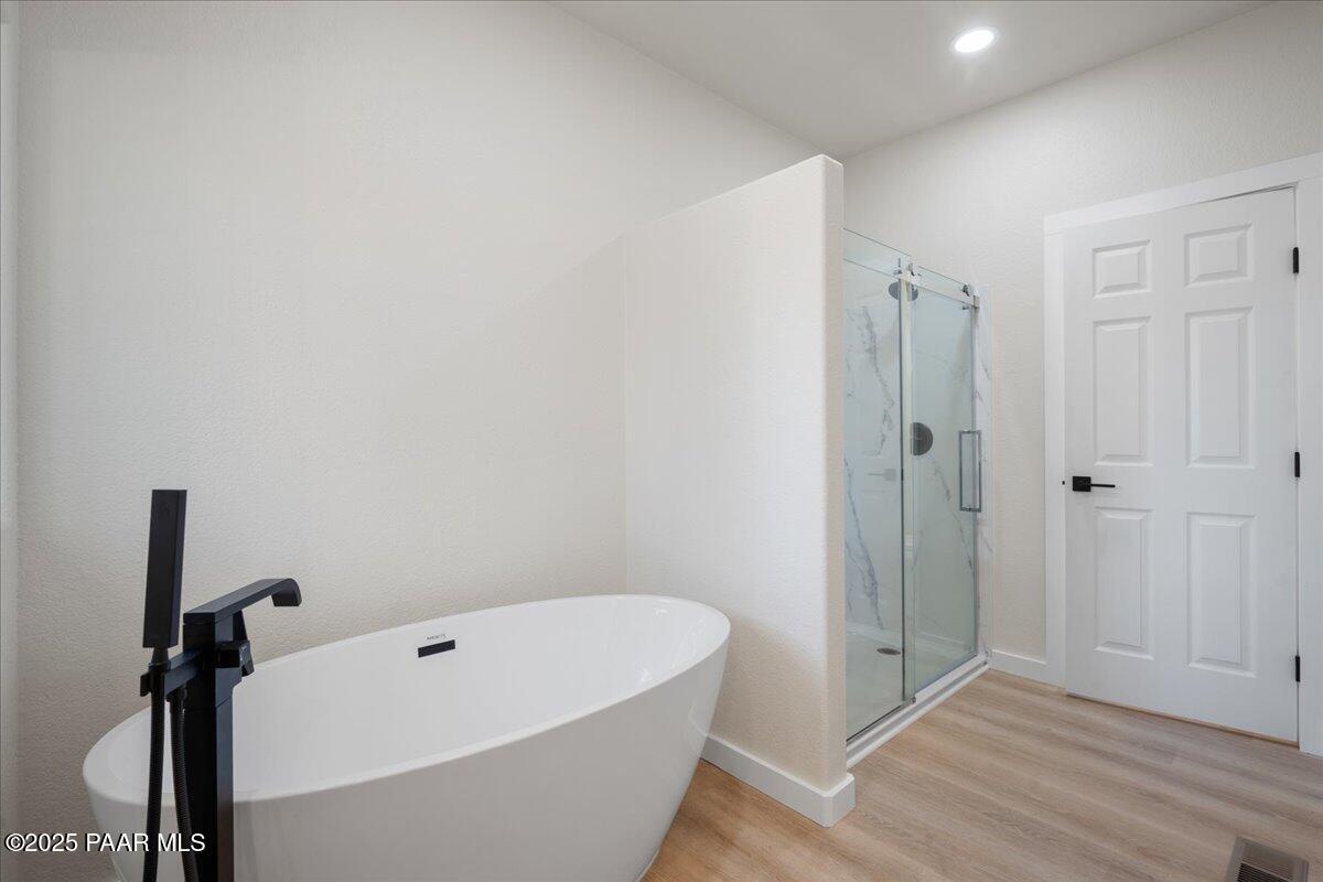 345 Banning Creek Road Prescott, AZ 86303 - Photo 21 of 41 a bathroom with a tub and shower