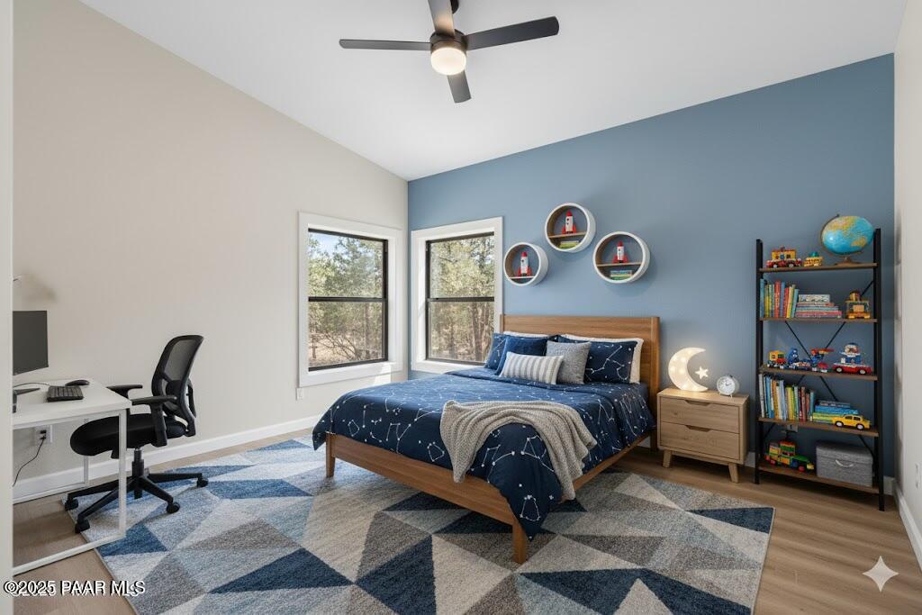 345 Banning Creek Road Prescott, AZ 86303 - Photo 26 of 41 a bedroom with a bed and a window