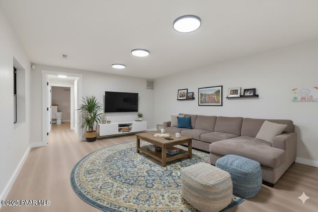 345 Banning Creek Road Prescott, AZ 86303 - Photo 29 of 41 a living room with furniture and a flat screen tv