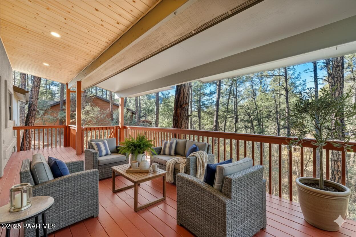 345 Banning Creek Road Prescott, AZ 86303 - Photo 36 of 41 a balcony with furniture and wooden floor