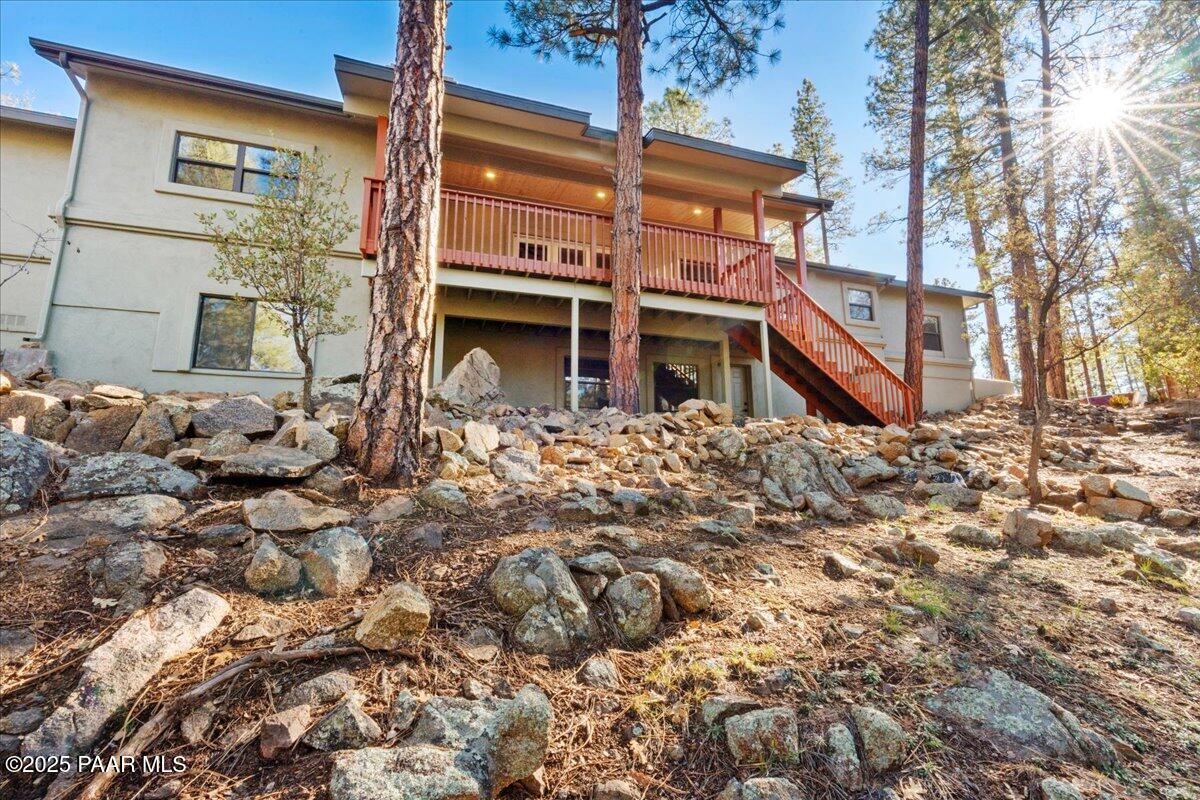 345 Banning Creek Road Prescott, AZ 86303 - Photo 38 of 41 a backyard of a house with large trees