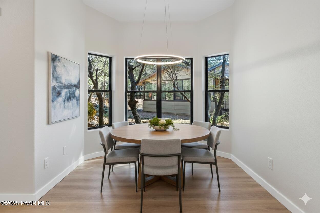 345 Banning Creek Road Prescott, AZ 86303 - Photo 8 of 41 a dining room with furniture and window