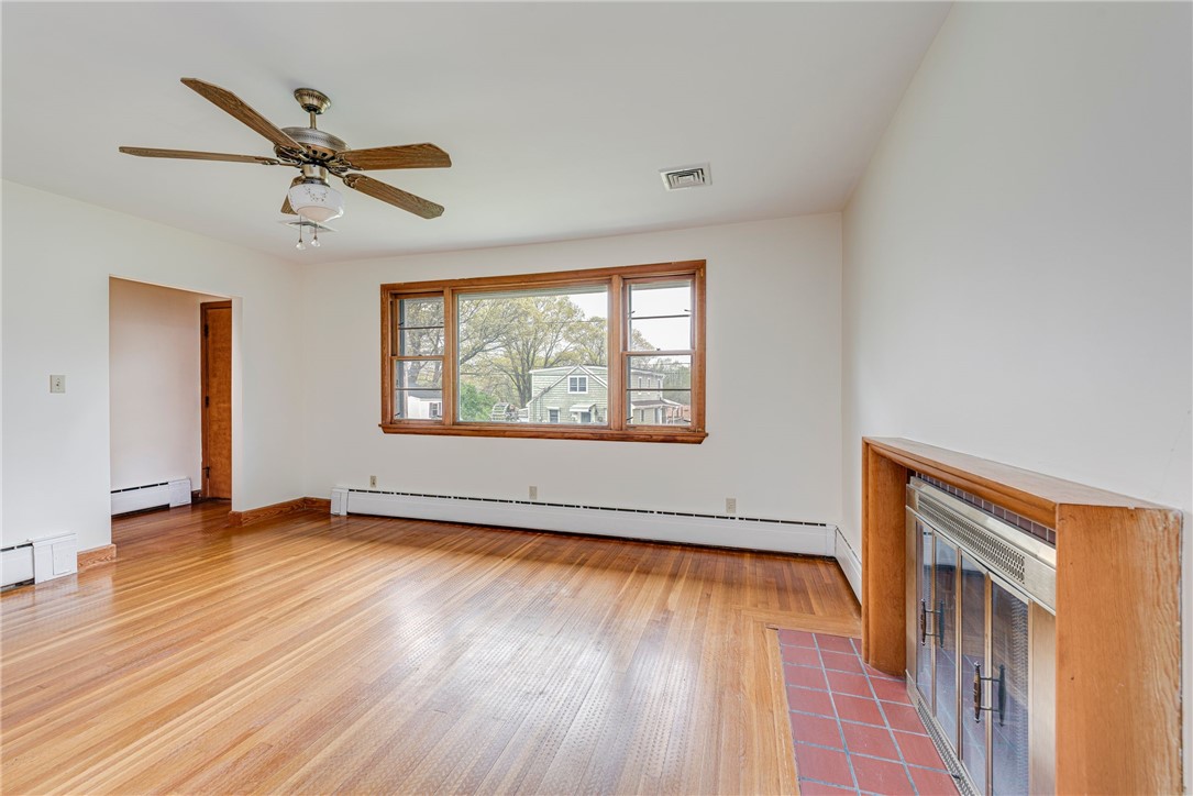 171 Iroquois Road Cumberland, RI 02864 - Photo 4 of 32 Living Room w/fireplace