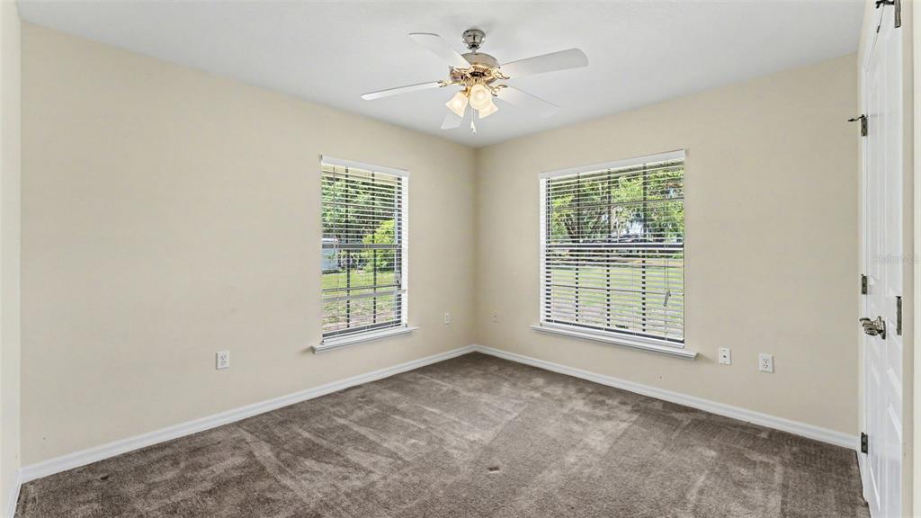 8525 North Campbell Road Lakeland, FL 33810 - Photo 16 of 45 a view of an empty room with a window