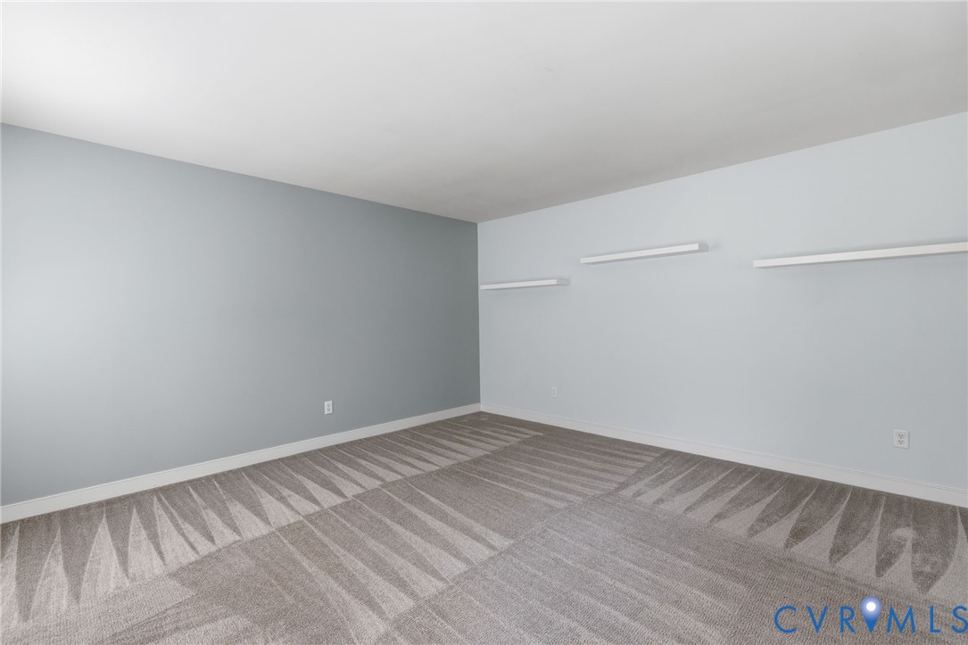 13524 Mountcastle Road Chesterfield, VA 23832 - Photo 9 of 44 Spacious room featuring light blue walls, white tr