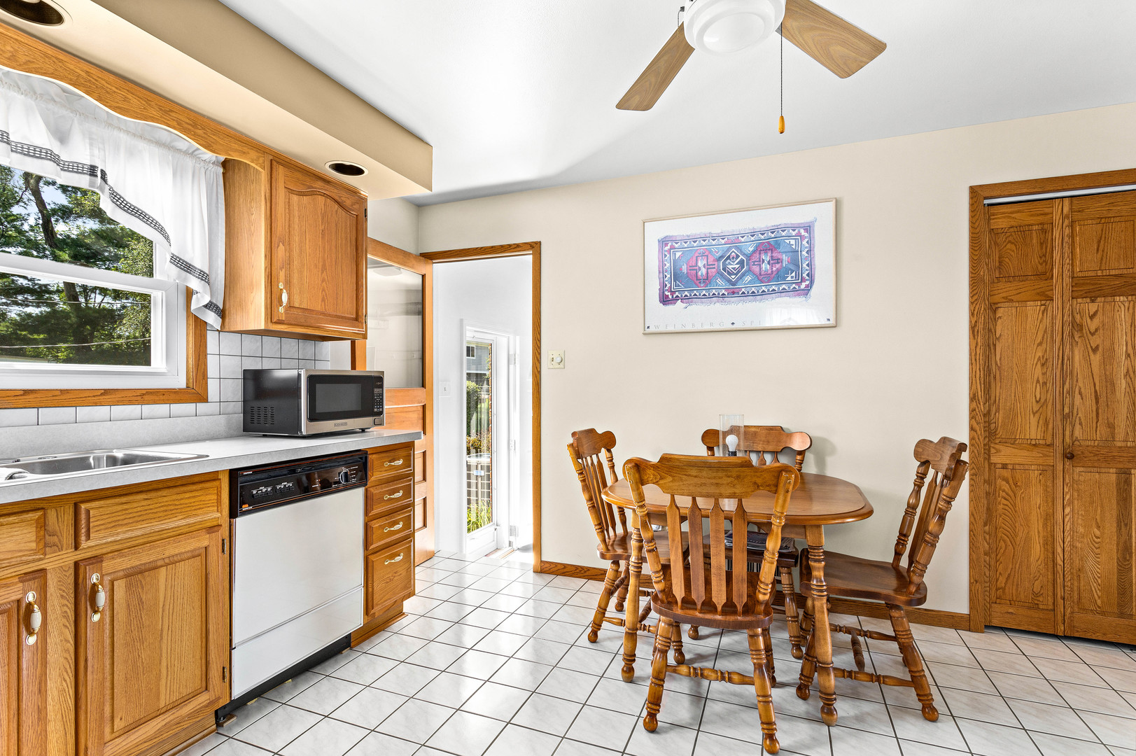 11133 Revere Road Mokena, IL 60448 - Photo 11 of 22 a view of a dining room with furniture and a window
