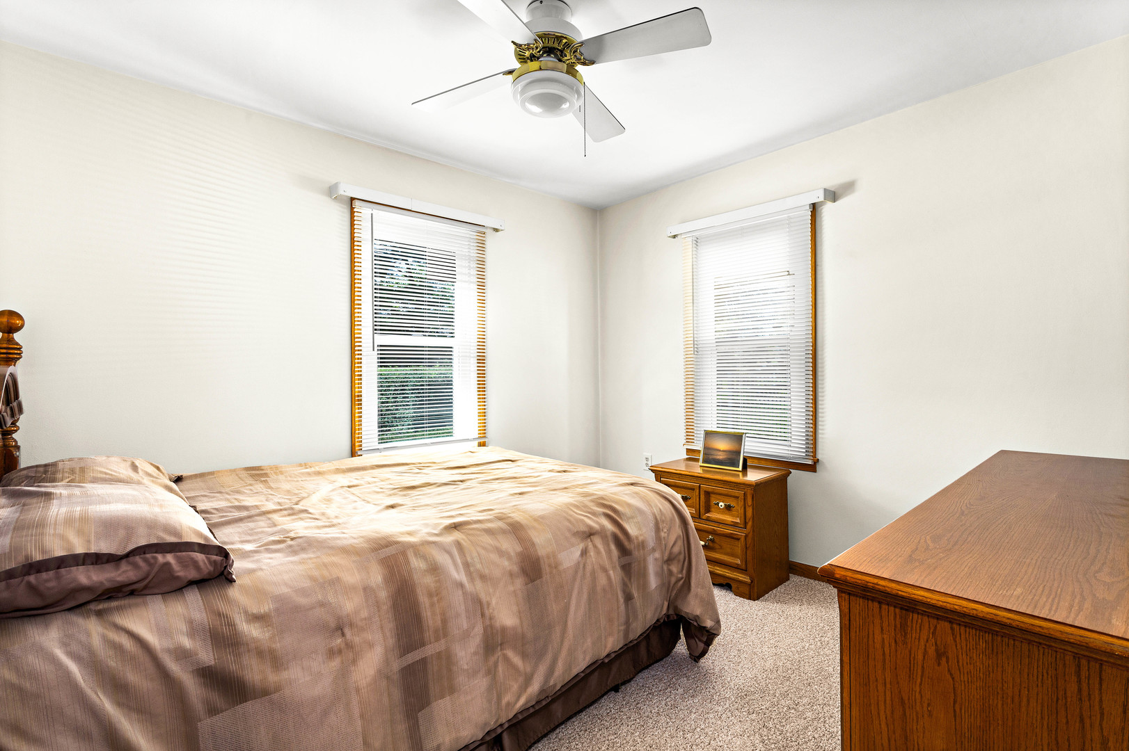 11133 Revere Road Mokena, IL 60448 - Photo 15 of 22 a bedroom with a bed and window
