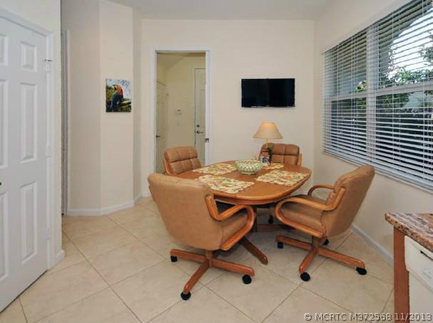 134 Southwest Walking Path Stuart, FL 34997 - Photo 7 of 25 Other. Breakfast Nook. Tile on diagonal. Large Pantry Closet. Views of the tropical landscape.