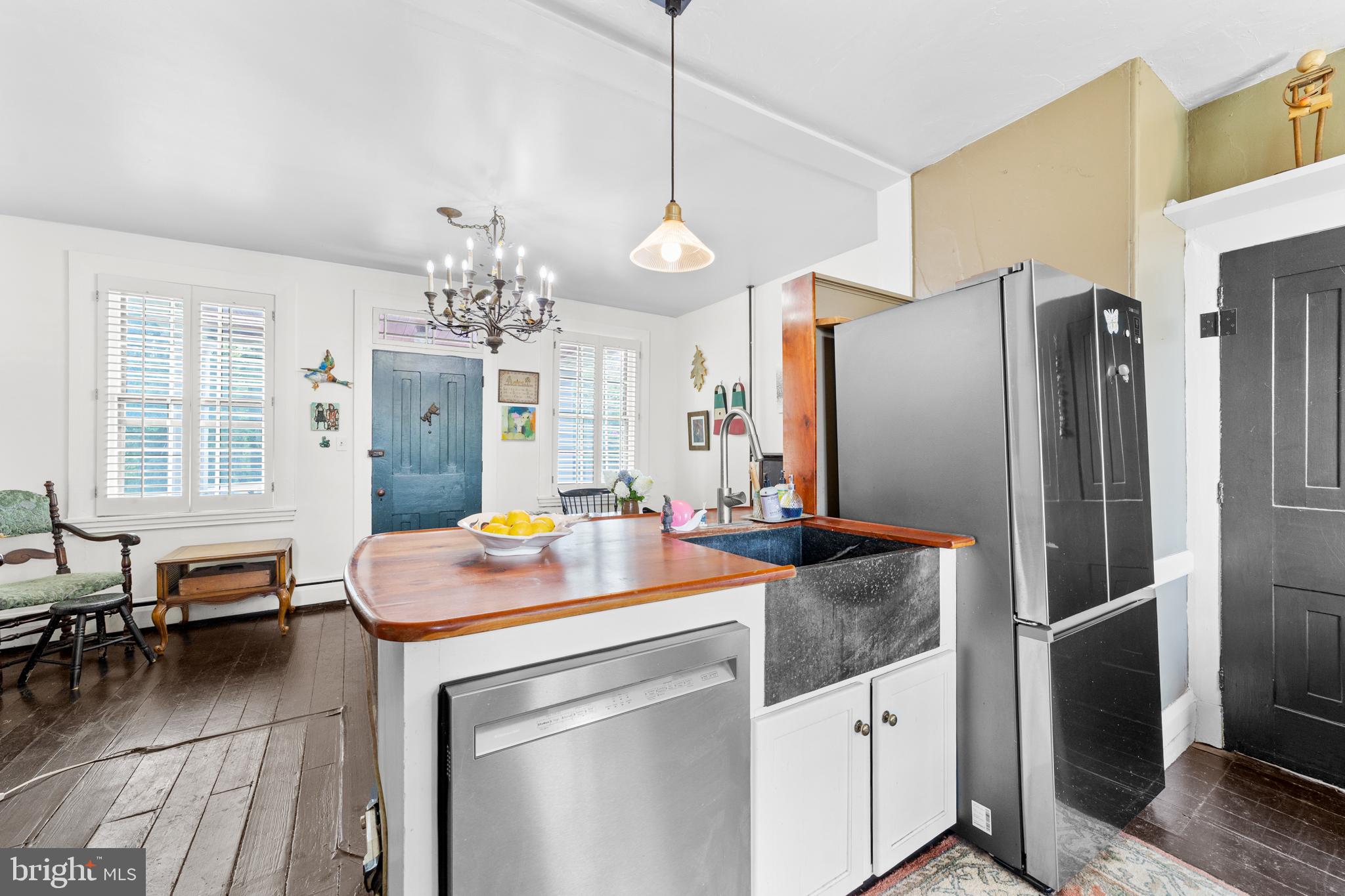 327 East Street Road Kennett Square, PA 19348 - Photo 12 of 41 a kitchen with stainless steel appliances granite countertop a sink refrigerator and cabinets