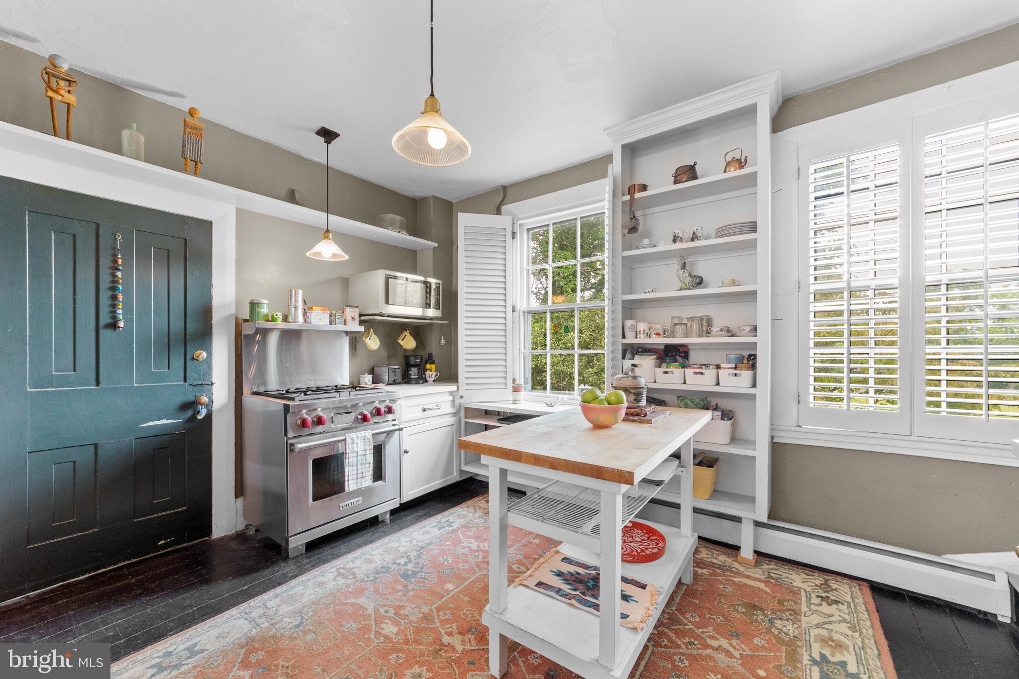 327 East Street Road Kennett Square, PA 19348 - Photo 13 of 41 a kitchen with a stove a sink and a refrigerator