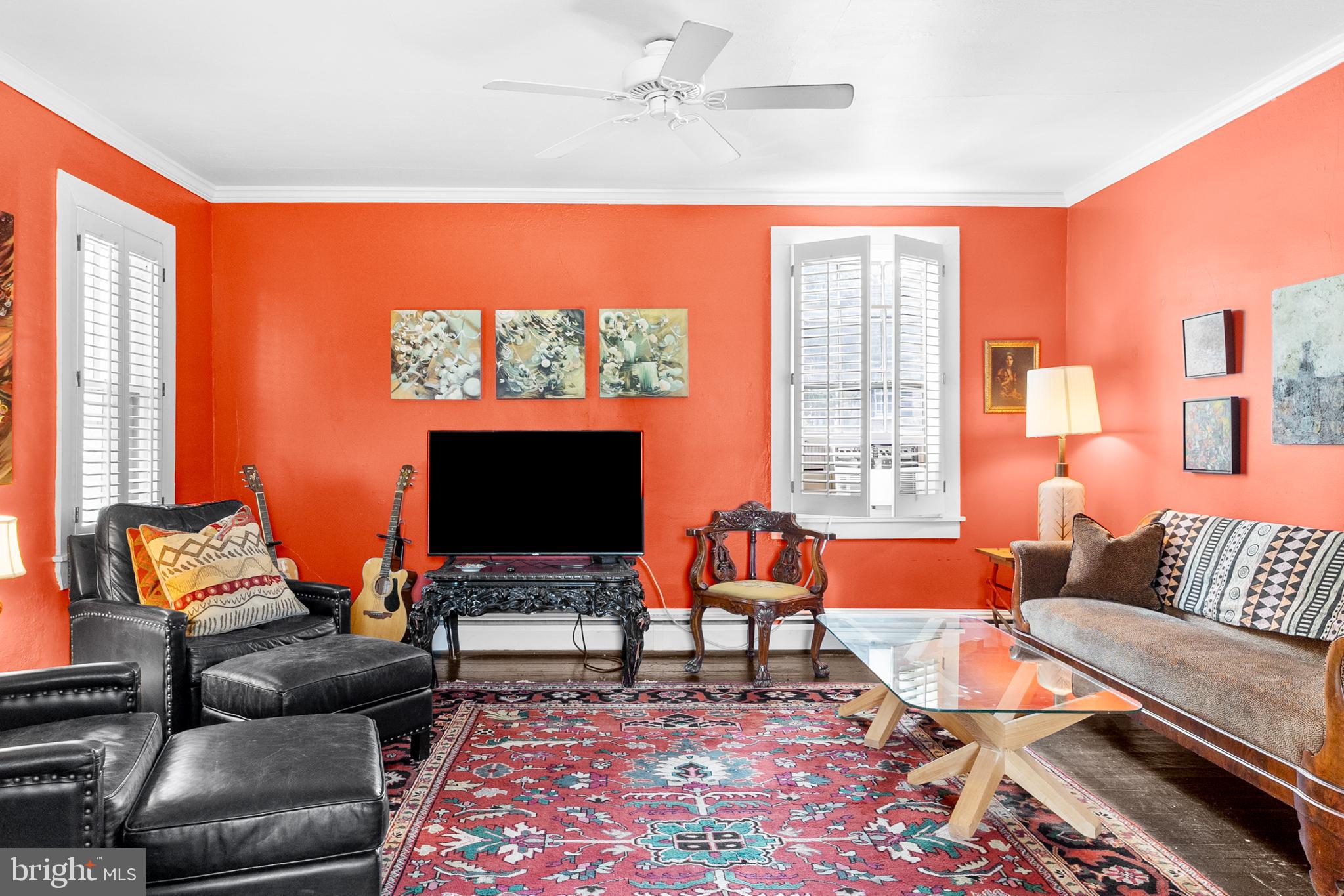 327 East Street Road Kennett Square, PA 19348 - Photo 17 of 41 a living room with furniture a flat screen tv and a window