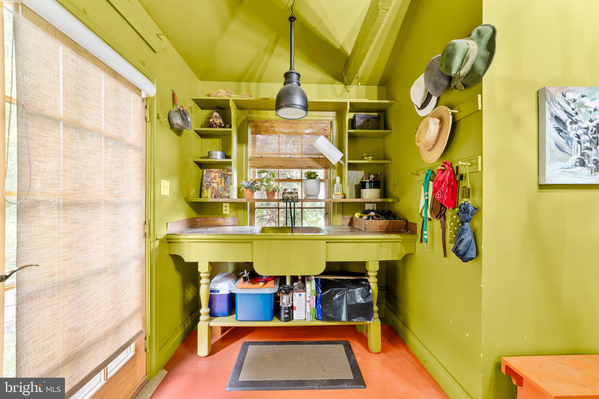 327 East Street Road Kennett Square, PA 19348 - Photo 20 of 41 a room with mirror table and chairs