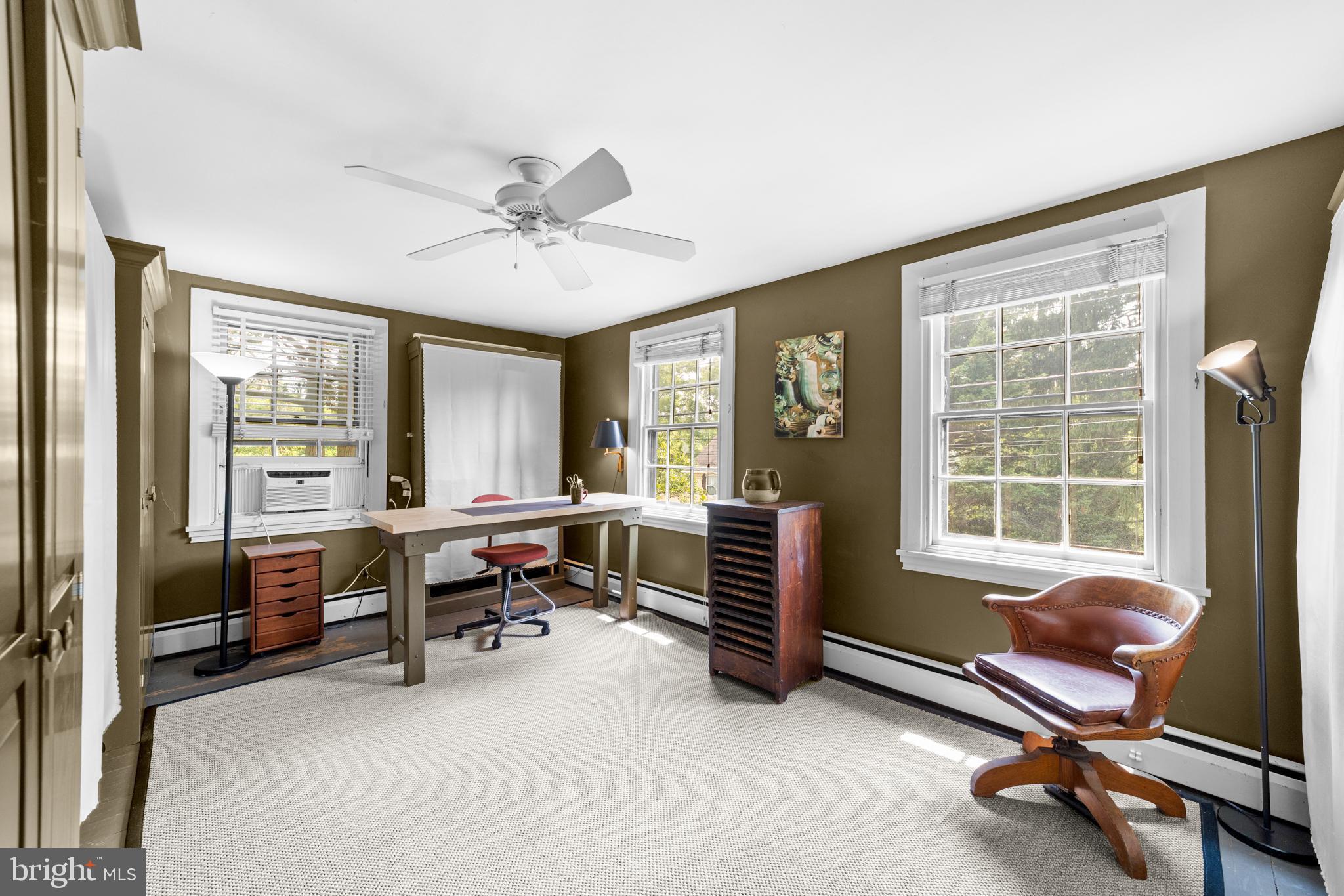 327 East Street Road Kennett Square, PA 19348 - Photo 26 of 41 a view of a livingroom with workspace and a window