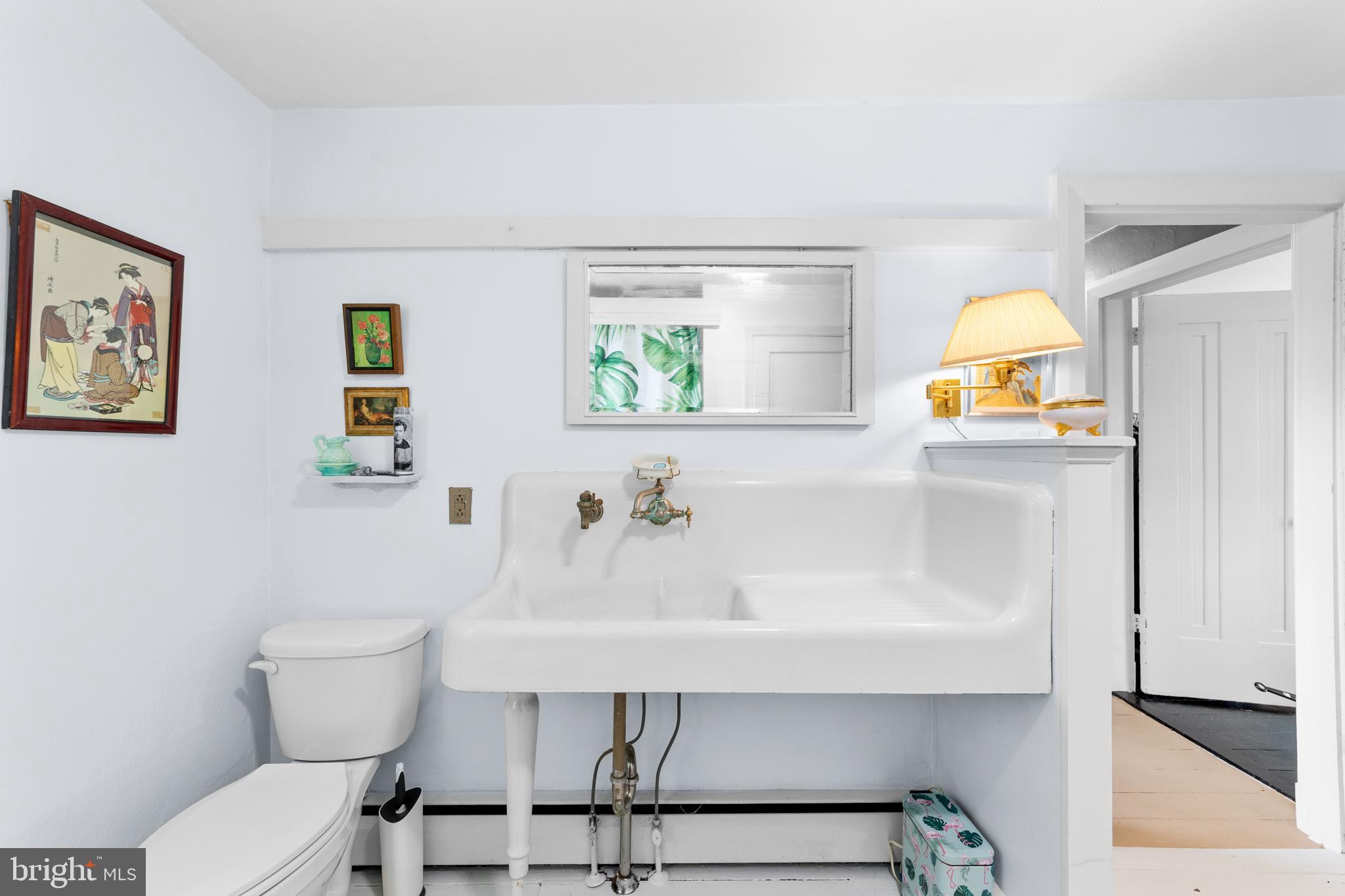 327 East Street Road Kennett Square, PA 19348 - Photo 29 of 41 a bathroom with a sink and a mirror