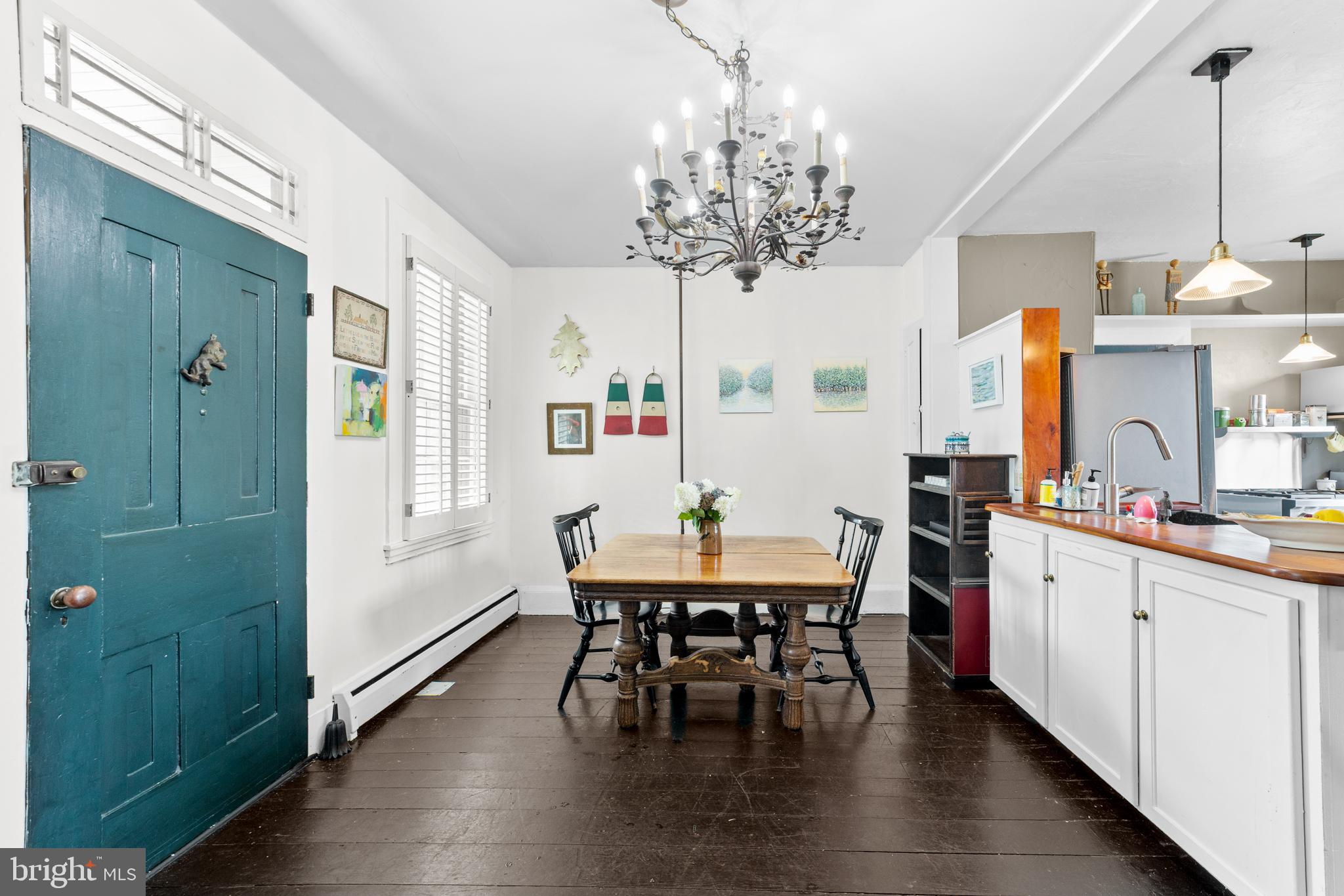 327 East Street Road Kennett Square, PA 19348 - Photo 9 of 41 a view of a dining room with furniture window and wooden floor