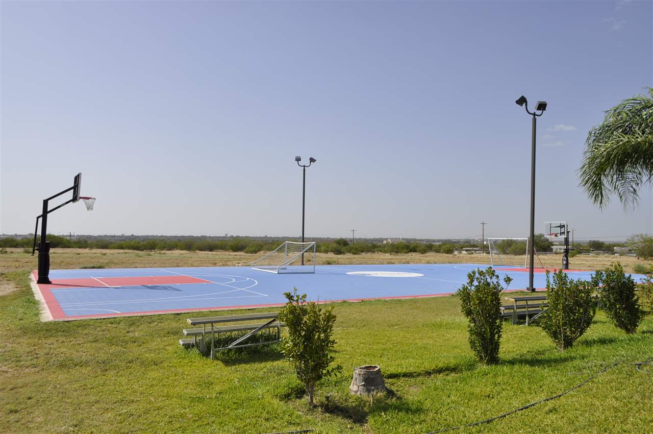 8216 Casa Verde Road, Unit E163 Laredo, TX 78041 - Photo 19 of 20 a view of an swimming pool and outdoor space
