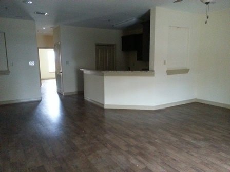 8216 Casa Verde Road, Unit E163 Laredo, TX 78041 - Photo 2 of 20 a view of a livingroom with wooden floor