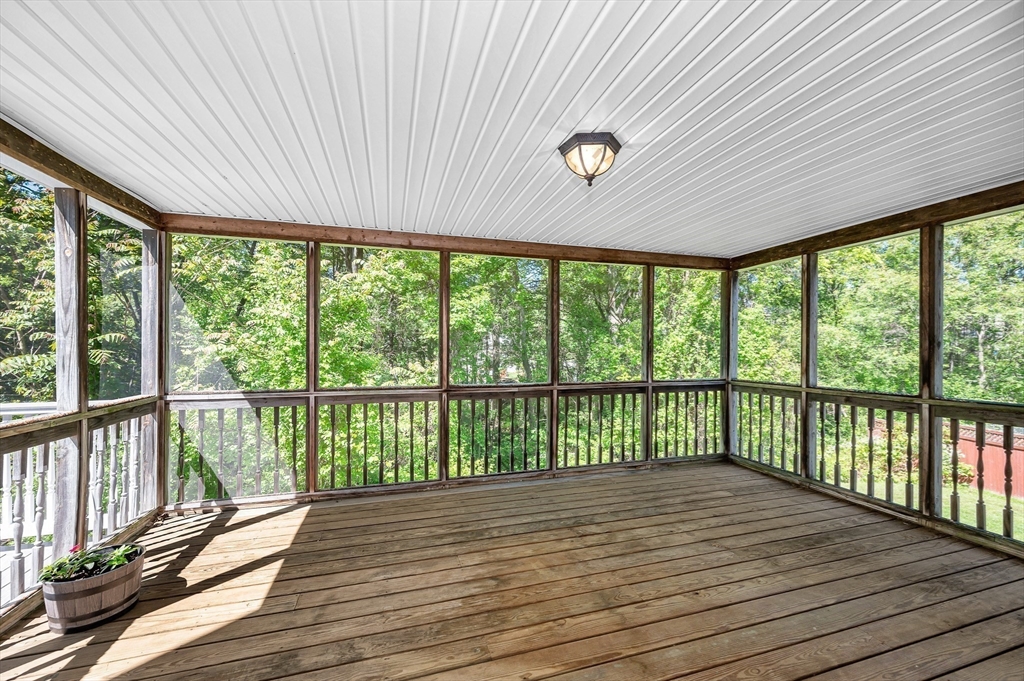 218 Acropolis Road Lowell, MA 01854 - Photo 14 of 39 a view of a balcony with wooden floor