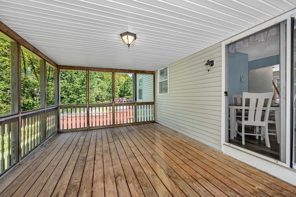 218 Acropolis Road Lowell, MA 01854 - Photo 15 of 39 a view of outdoor space with wooden floor
