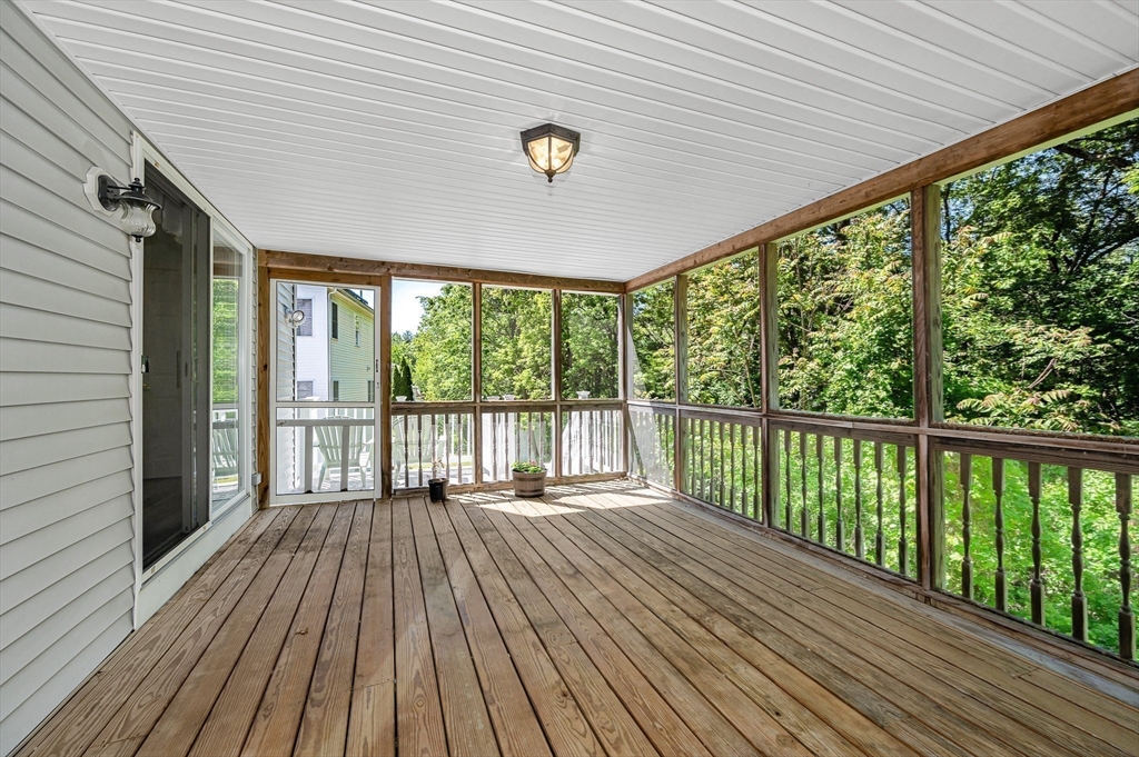 218 Acropolis Road Lowell, MA 01854 - Photo 16 of 39 a view of balcony with wooden floor