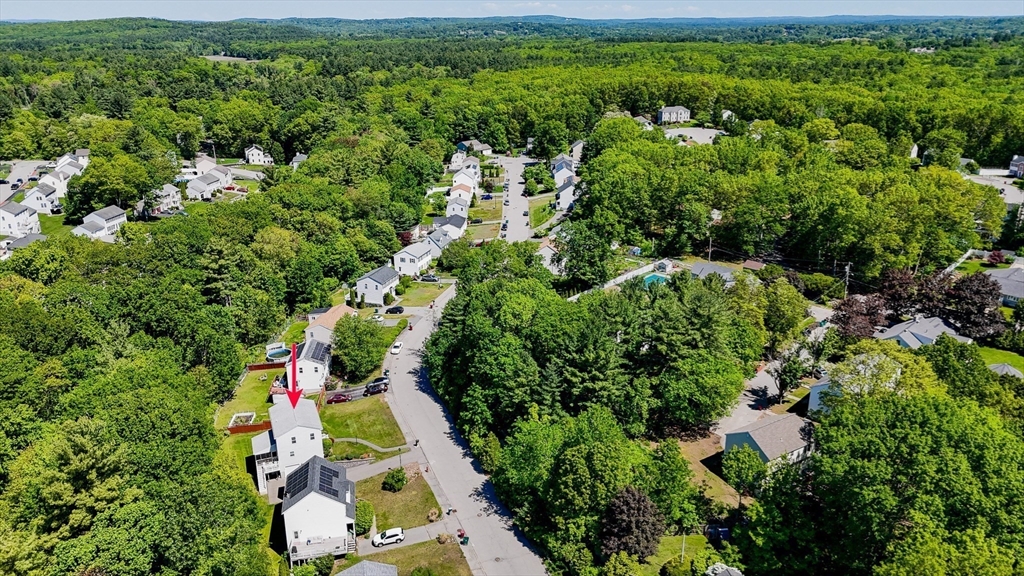218 Acropolis Road Lowell, MA 01854 - Photo 34 of 39 an aerial view of residential house with outdoor space and trees all around