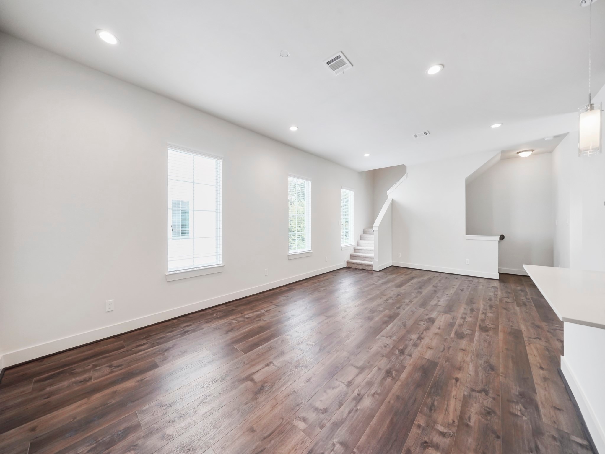 2007 Bauer Drive, Unit A Houston, TX 77080 - Photo 16 of 35 a view of empty room with wooden floor and fan