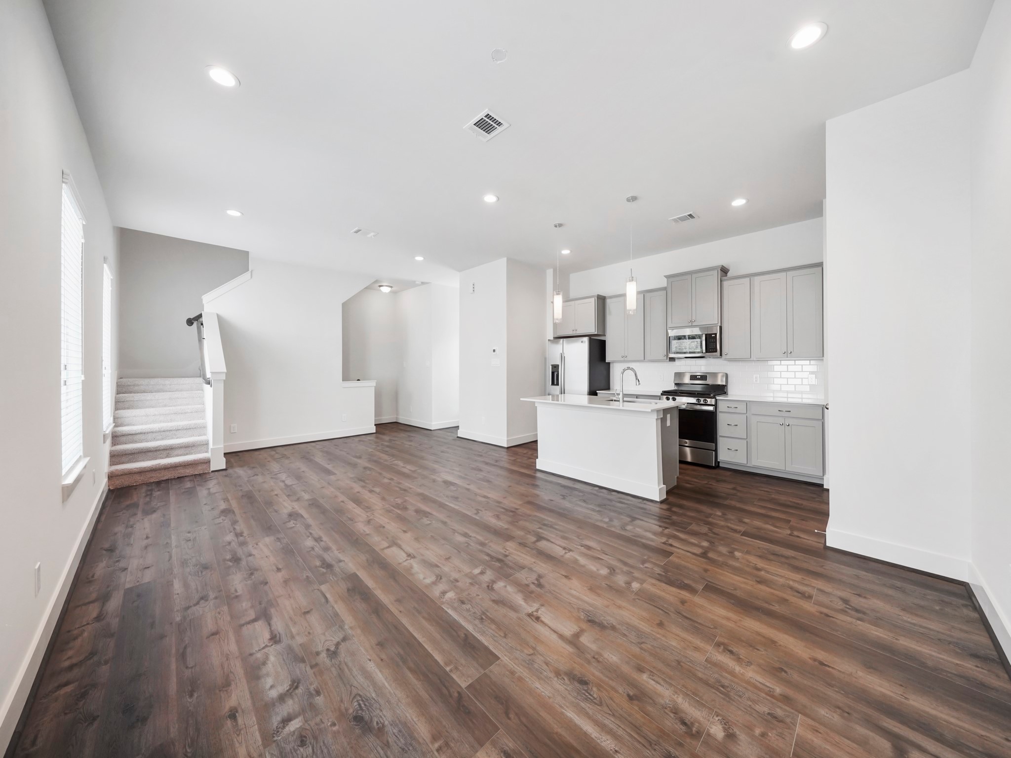 2007 Bauer Drive, Unit A Houston, TX 77080 - Photo 17 of 35 a view of kitchen with wooden floor